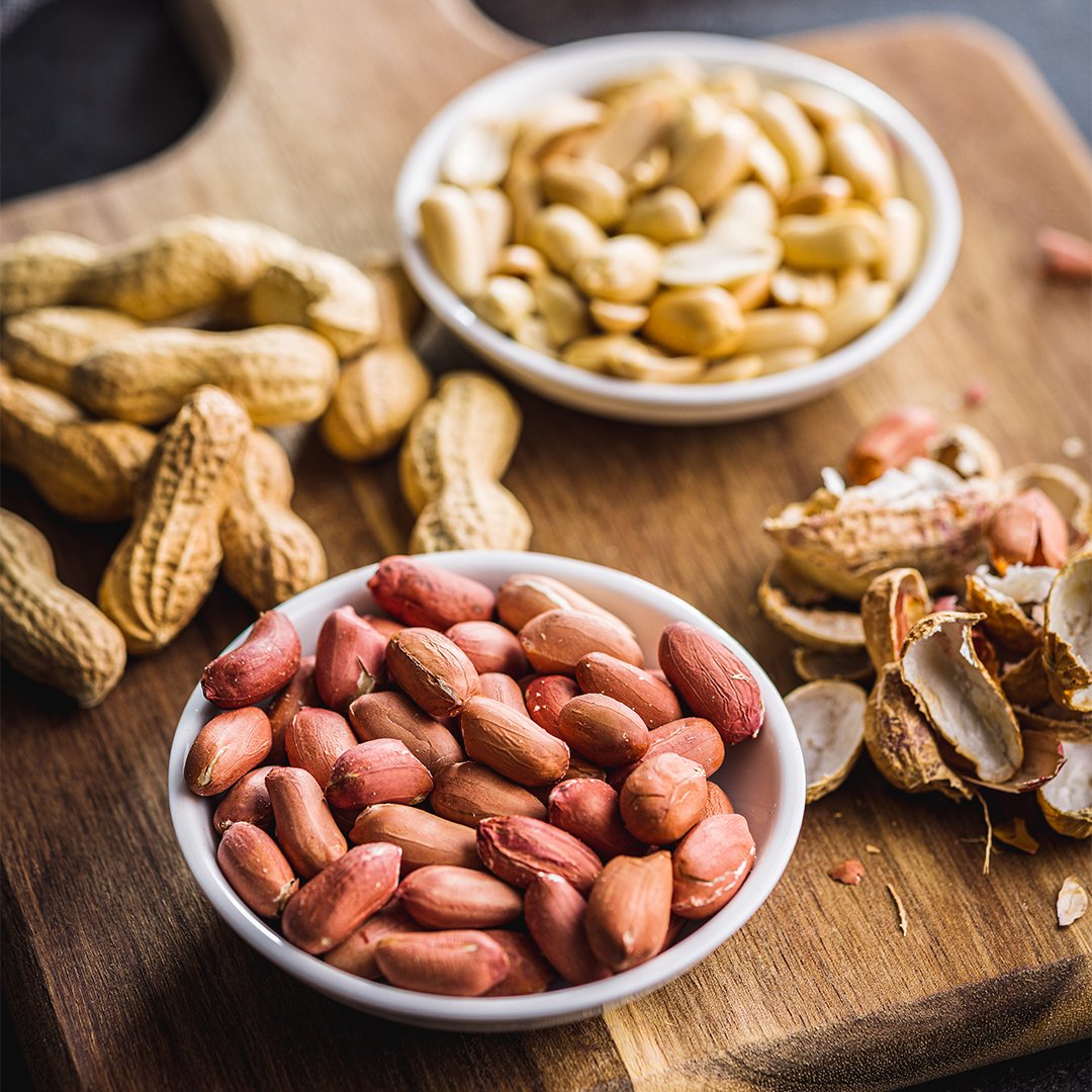 Untitled-1_0001_unpeeled-and-peeled-peanuts-in-bowl-on-kitchen-tab-2023-11-27-04-53-33-utc